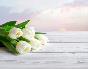 White tulips rest on a weathered, white wooden surface