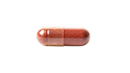 Single translucent capsule filled with reddish brown granular powder on black background pill medicine