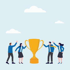 Group or team of people are holding a trophy and celebrating their victory