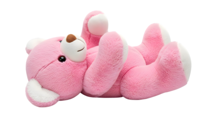 Pink plush teddy bear lying on its back with arms and legs raised in the air isolated on a transparent background