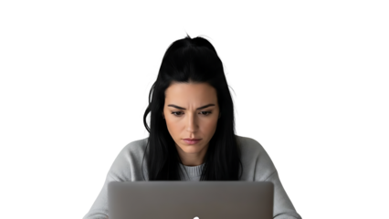 A woman intensely focused on her laptop screen in a dark setting on transparent background