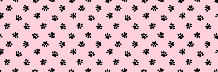 Seamless pattern of black cat or dog paw prints with heart shapes on a pastel pink background. Minimalist animal footprint wallpaper for pet-themed designs, textile, wrapping paper, and scrapbooking.