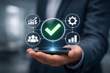 Hand holding smartphone with digital business growth and customer trust icons