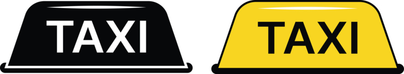 Black and yellow taxi signs with white text © Rehana