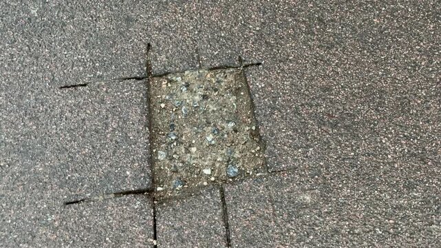 Place of selection of the kernel in the form of a rectangular from asphalt concrete pavement. Kern. Close-up

