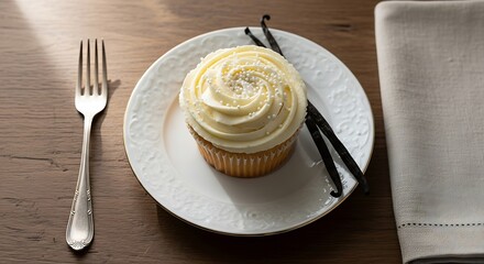 Single vanilla cupcake on a plate