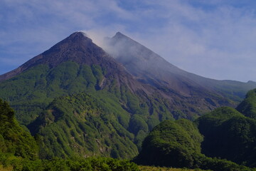 Fototapeta premium Mount Merapi or Gunung Merapi is an active stratovolcano located on the border between Central Java and Yogyakarta provinces, Indonesian.