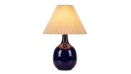 Isolated illuminated table lamp with pleated lampshade and reflective glossy blue base