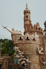 Historic monument blending diverse architectural styles, featuring ornate towers and intricate stonework in Benalmadena, Spain, captured to highlight its cultural significance and unique design