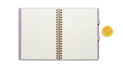 Isolated notebook with rings and blank paper pages for text plus lemon half in studio light