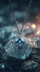 A diamond pendant on a chain on a rock in the rain