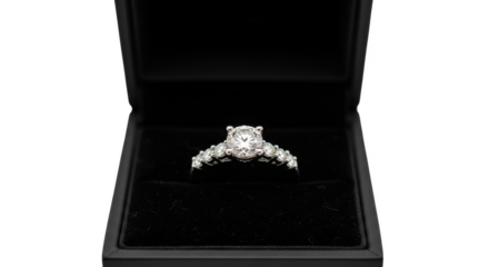 Diamond engagement ring with smaller stones on band in black velvet box diamond ring wedding ring