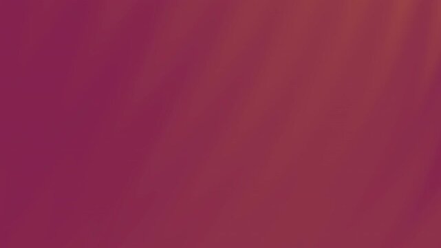 Blurred maroon and gold gradient suitable for backgrounds, branding, or digital designs with luxury or elegant themes. Vibrant color contrast.