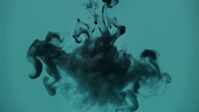 Black Ink Spreading Movement in Blue Water