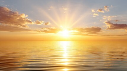 Obraz premium Serene Sunrise Over Calm Ocean with Golden Rays Illuminating Tranquil Water Surface and Soft Clouds in the Sky at Dawn