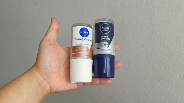 Istanbul, Turkey &ndash; December 23, 2025: A blue NIVEA Men Fresh Active roll-on deodorant held in a hand, ready for daily grooming. Compact, travel-friendly packaging and fresh scent ideal for men