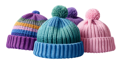 Four colorful ribbed knit beanies with pom-poms, close up, isolated on black