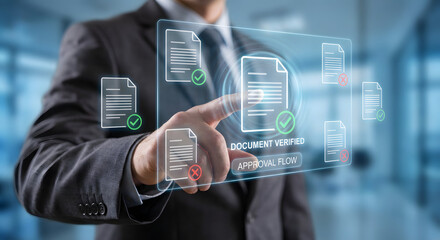 Businessman verifying digital documents on a transparent screen