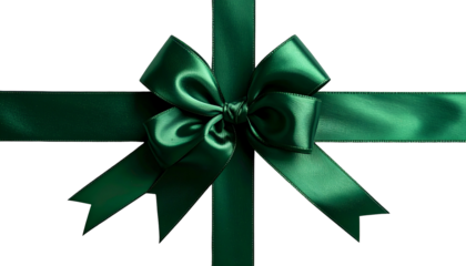 Close-up of a green satin bow and ribbon cross on a black background, perfect present