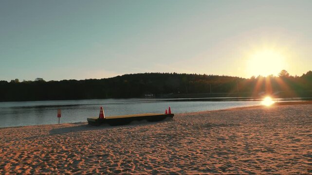 Sunset Golden Hour In Autumn Over A Lake Beach In Pocono Mountains