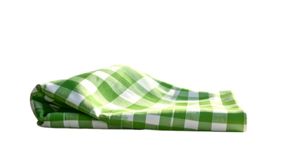 A close-up of a neatly folded green and white checkered cloth on a black background