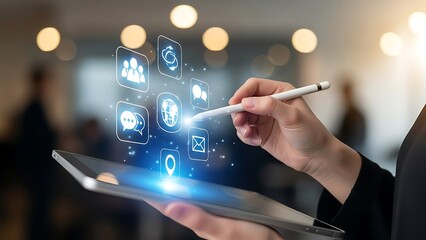 Person interacting with a digital interface displaying various icons and symbols on a tablet in a modern office setting