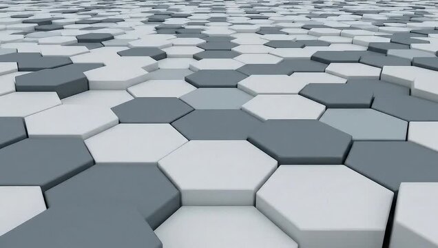 A close-up view of a 3D hexagonal pattern with white and gray tiles