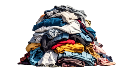 A large, colorful pile of various folded and crumpled garments, isolated on a black background