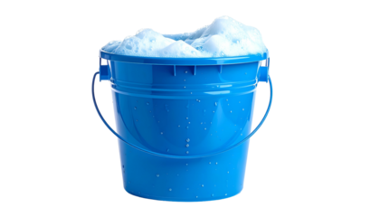 Blue bucket filled with overflowing, foamy, white suds, with a black background