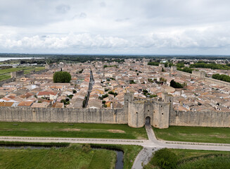Drone photo of Old, historic city wall of Aigues Mortes, Camargue, Provence, France