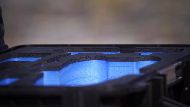 Drone Remote Controller Taken from Protective Hard Case Outdoors