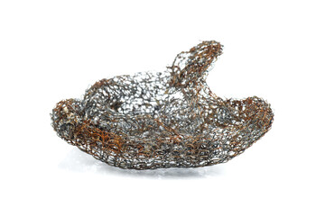 Old kitchen scrubber isolated on a white background