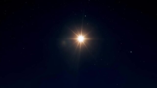 Star of Bethlehem fading across a dark night sky for Christmas and New Year concept