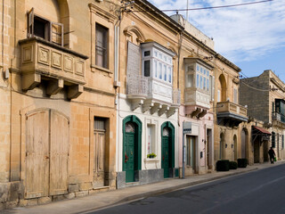 Obraz premium Victoria, Gozo, Malta — colorful traditional balconies and limestone facades in the old town