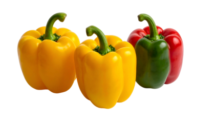 Close-up of three ripe bell peppers in vibrant yellow, green, and red hues