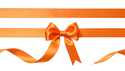 Orange satin ribbon arranged in a bow, with flowing ends, set against a black backdrop