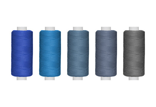 Assortment of Blue and Grey Sewing Threads: Five Vibrant Spools for Crafting and Textile Projects