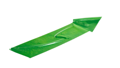 A shiny green plastic object, arrow-shaped, with a raised middle and sharp angle