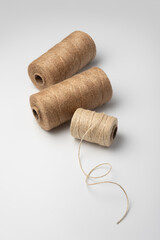 Natural Jute Twine Spools on White Background