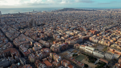 Aerial panorama view around the city and cathedral sagrada familia of Barcelona on a sunny day in early spring in spain catalonia
