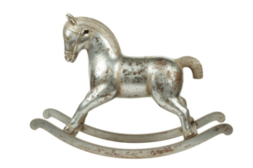 Vintage Metal Rocking Horse in Distressed Silver Finish on Rustic Rockers in Warm Studio Lighting for Toy Collectors Page