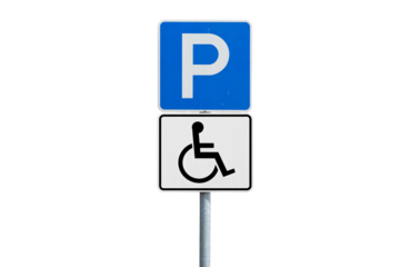 Accessible parking sign with blue and white color on metal pole in clear signage for disability awareness