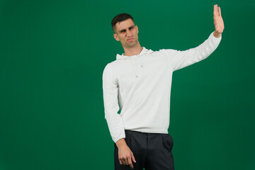 Businessman Showing Stop Hand Gesture, Concept of denial, saying no, rejection, boundary setting, or warning in a professional context. Ideal for business.