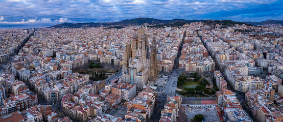 Aerial panorama view around the city and cathedral sagrada familia of Barcelona on a sunny day in early spring in spain catalonia
