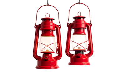 Two red, glowing oil lanterns hanging against a black background