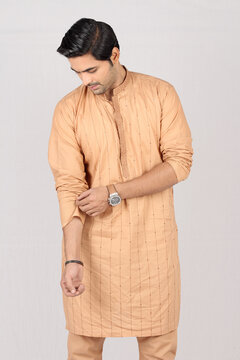Pakistani Male Model Posing in traditional kurta and pajama in Style