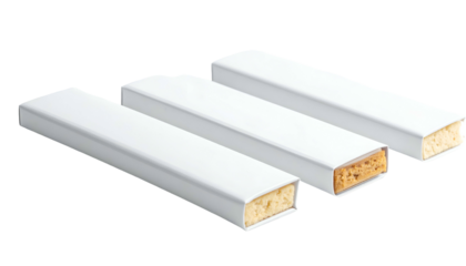 Three rectangular items in white packaging. One item partially reveals a tan-colored, textured interior. Items are set against a pure black background