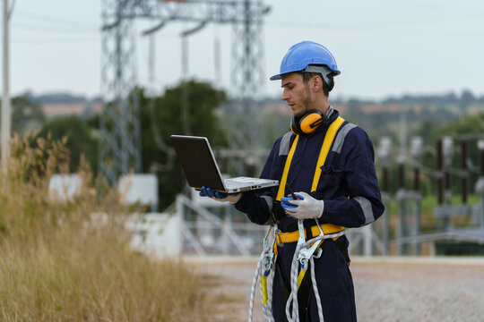 Electrical engineers are checking the operation and power distribution systems within the substation receiving power from the wind farm.	 - Powered by Adobe
