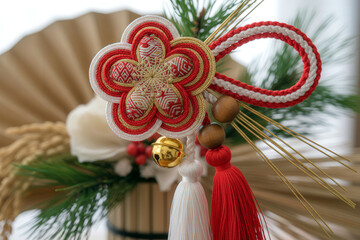 Traditional Japanese decorative cord in close-up, captured with gentle light to showcase texture and seasonal elegance.