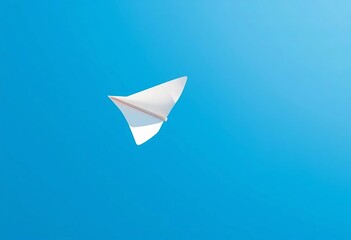 A paper airplane in flight, soaring against a clear blue sky, summer, technology